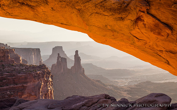 The Washerwomen under Mesa Arch